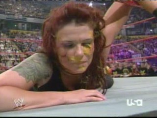 wwe:- Lita sprayed in the face with mustard