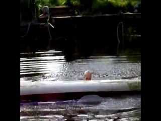 Splash and swimming in a lake
