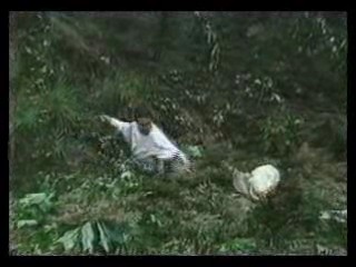 girl in wedding dress in bog
