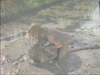 The Big Bird Cage; muddy Pam Grier