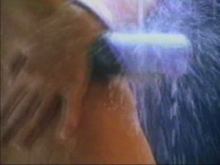 Katerina Witt getting very wet in the rain