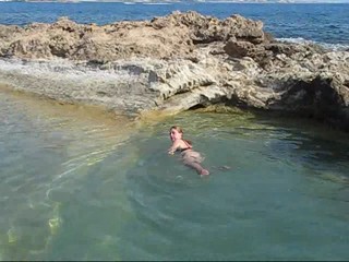 Wetmar swimming in black underwear in Cyprus