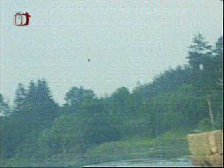Early 80's  movie with sinking canoe